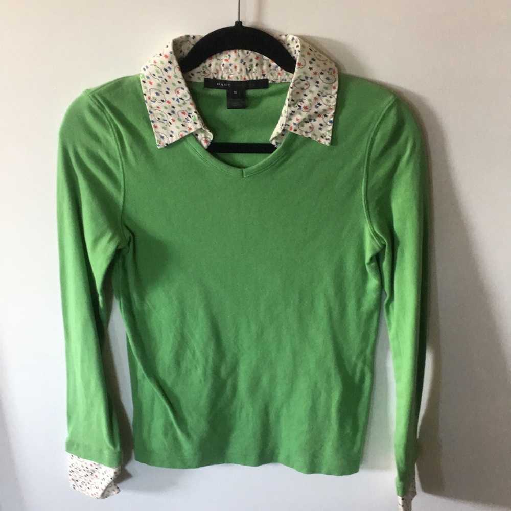 Green sweater with rainbow collar